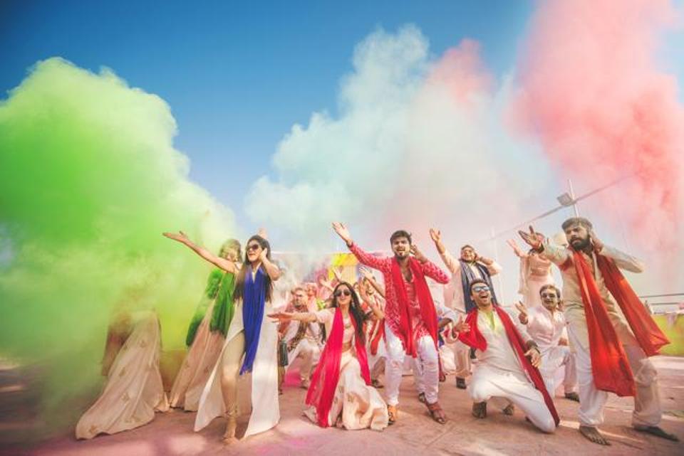 Holi themed weddings, young couples are picking over fancy cocktails! 