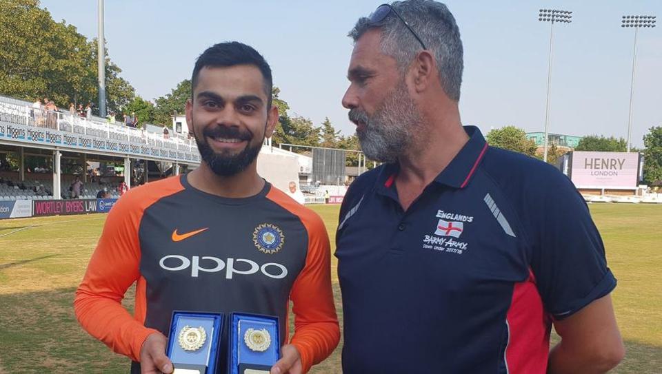 Virat Kohli presented with Player of the Year trophies