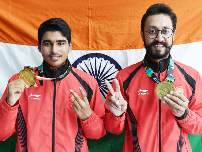 3 for a joy: Schoolboy, lawyer, veteran show India's shooting 'range'