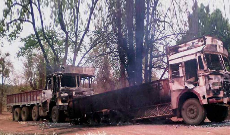Naxals torch five empty trucks in C'garh