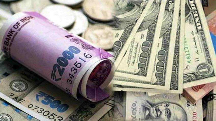 Rupee slumps 30 paise to close at record low of 74.06