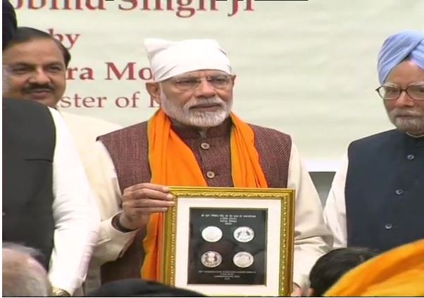 Prime Minister Narendra Modi releases commemorative coin on 352nd parkash purab of Sri Guru Gobind Singh Ji