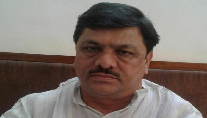 Naresh Kaushik land occupation allegations