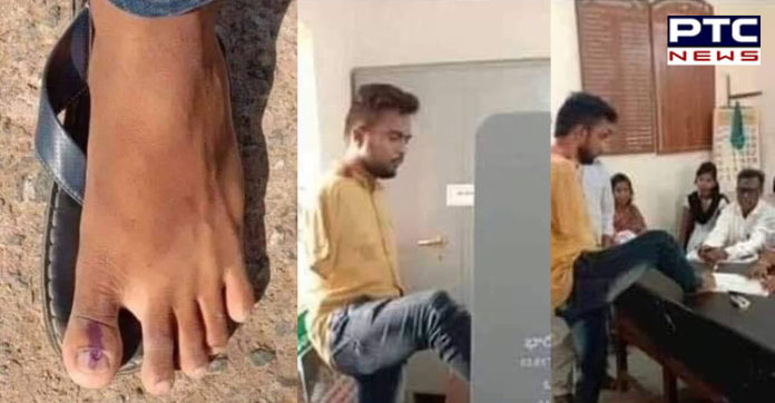 ਨੌਜਵਾਨ ਦੇ ਹੌਸਲੇ ਨੂੰ ਸਲਾਮ : ਹੱਥ ਨਾ ਹੋਣ ਕਰਕੇ ਪੈਰ ਨਾਲ ਪਾਈ ਵੋਟ , ਹਰ ਕੋਈ ਕਰ ਰਿਹੈ ਸਲਾਮ Legendary vote due to lack of hand pictures viral