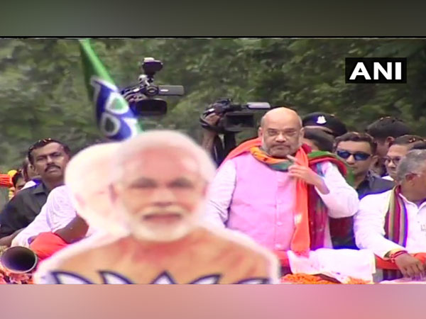 Amit Shah holds roadshow in Mamata's turf, clashes break out