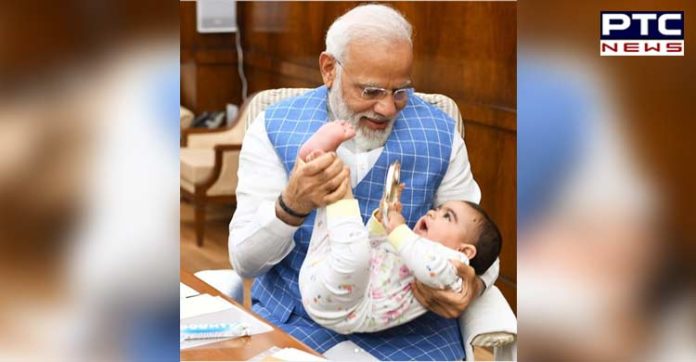 PM Narendra Modi with baby: When Special Friend came to meet him in Parliament PM Narendra Modi with baby: When Special Friend came to meet him in Parliament