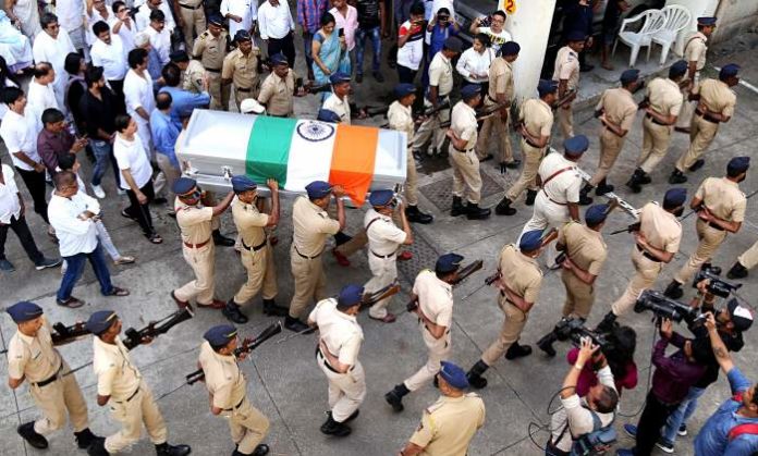Police carry the mortal remains of music director and background score composer mohammed zahur khayyam during his last rites
