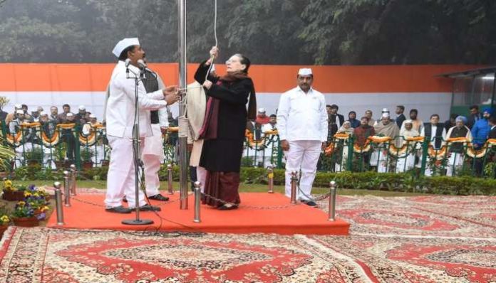 Sonia Gandhi unfurls the National Flag at the AICC HQ on Congress Foundation Day Sonia Gandhi unfurls the National Flag at the AICC HQ on Congress Foundation Day