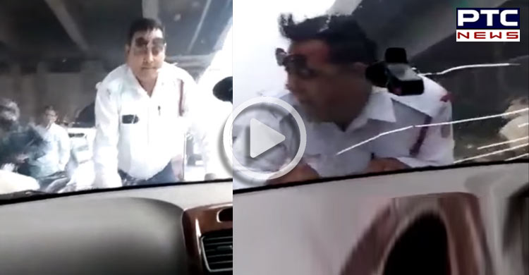 Delhi man drags traffic cop on car’s bonnet for 2 km [VIDEO]