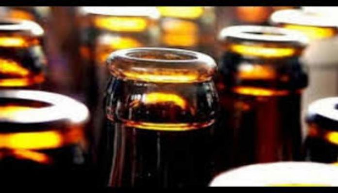 Truck carrying 1080 liquor bottles seized, one held (2) Illegal liquor bottles seized