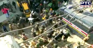 Farmers Lathicharge at Tikri border, Police use water cannon & tear gas shells