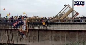 Farmers at Sambhu border dig up Haryana police barricades and throw them into canal
