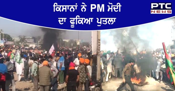 Farmers burn effigies Modi 1 Farmers burn effigies of PM Modi at Delhi's Singhu border
