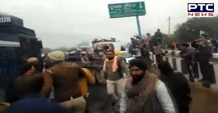 Ambala: Haryana Police uses water cannon as farmers break barricades Ambala: Haryana Police uses water cannon as farmers break barricades