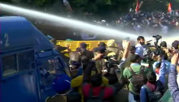 Police use water cannon on Punjab Youth Congress workers (2) Protest Outside Haryana CM Residence