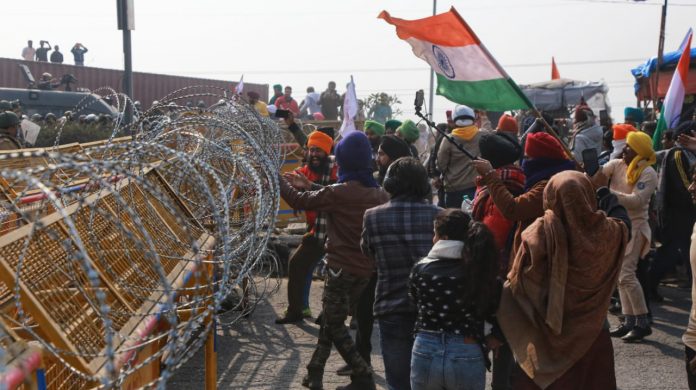 Delhi Police detained 200 protesters in connection with violence at Red Fort during the tractor march in Delhi. 9 leaders including Yogendra Yadav named in FIR.