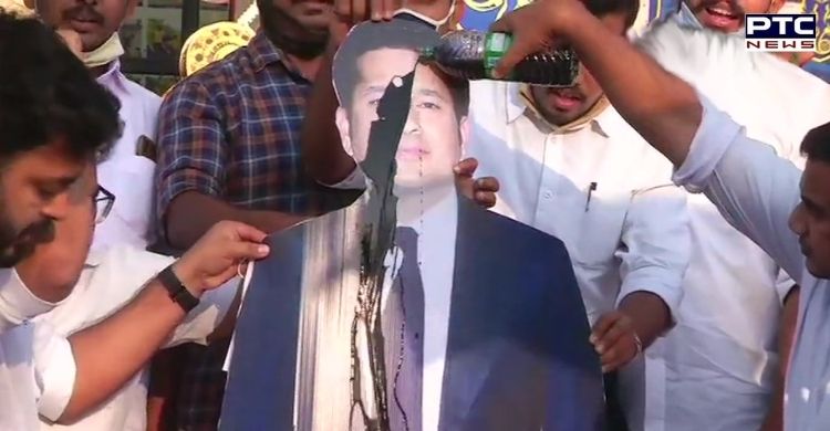 Farmers Protest: Congress workers pour black oil on a cut-out of Sachin Tendulkar