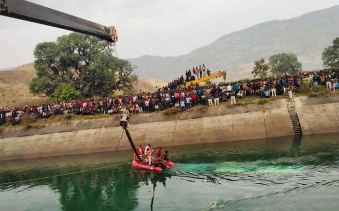 bus falls canal