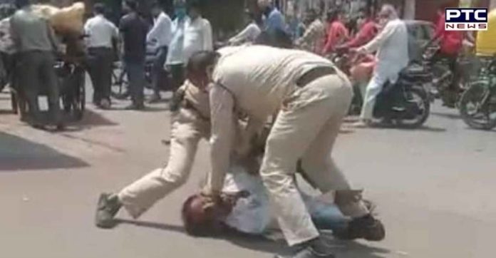 WATCH: 2 Madhya Pradesh policemen thrash man for not wearing mask WATCH: 2 Madhya Pradesh policemen thrash man for not wearing mask