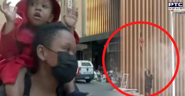 South Africa: Mother throws her baby to safety from burning building