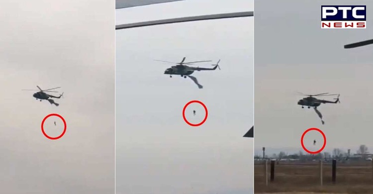 Afghanistan: Man seen dangling from helicopter flag installer, not body, say Afghan journalists