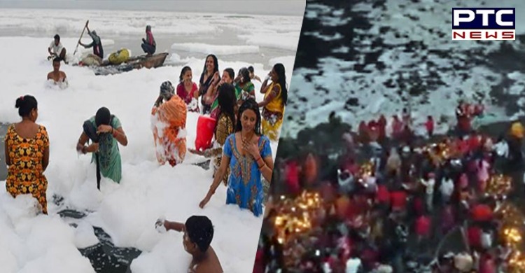 Delhi: Devotees perform rituals in toxic foam-laden Yamuna on final day of Chhath Puja