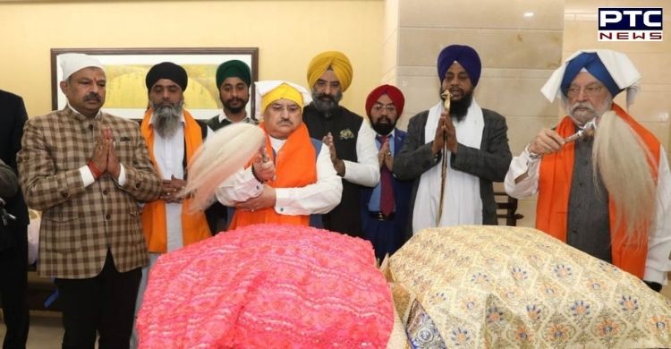 Hardeep Puri, JP Nadda receive Sri Guru Granth Sahib brought from Afghanistan