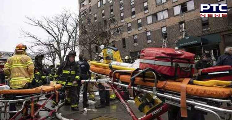 Nine children among 19 dead in massive fire at New York building