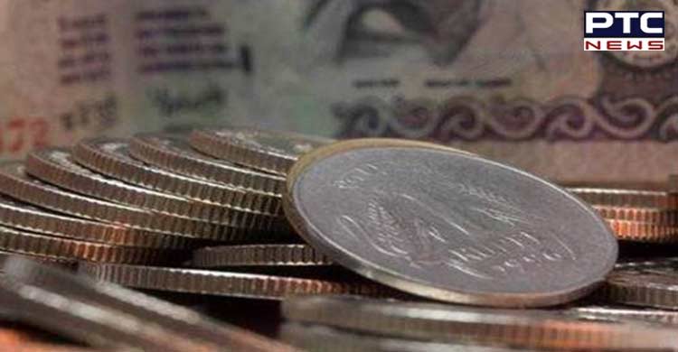 Rupee slumps 14 paise to 77.69 against US dollar 