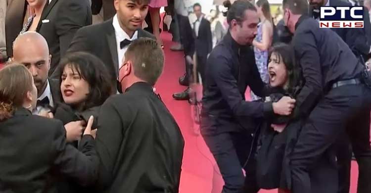 'Stop raping us': Topless woman storms Cannes red carpet to protest against sexual violence in Ukraine