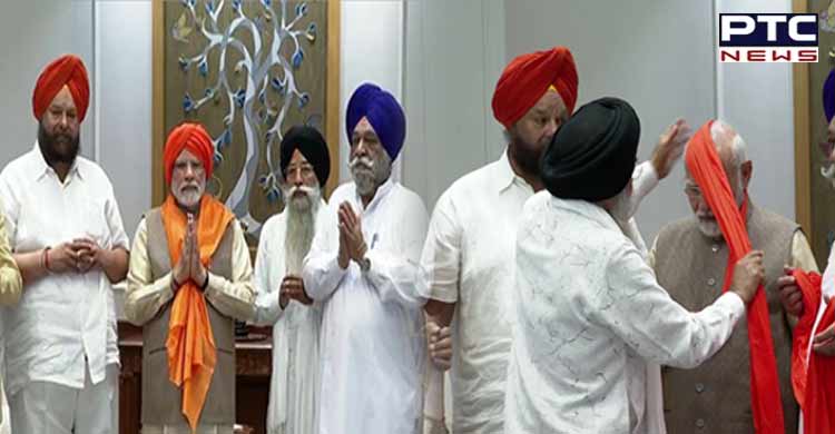 Sikh delegation meets PM Modi at his residence, offers prasad of 'Akhand Paath'