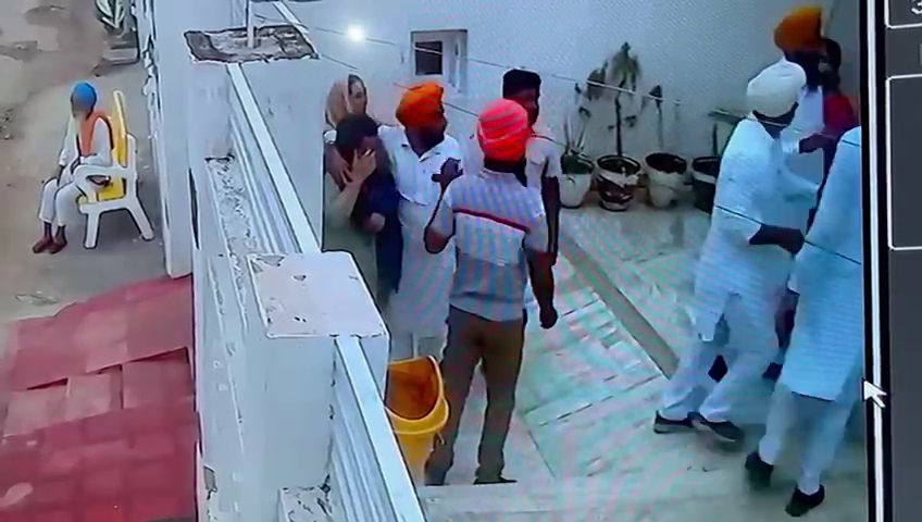 A still from CCTV footage; wherein Baljinder Kaur is being assaulted by her husband.